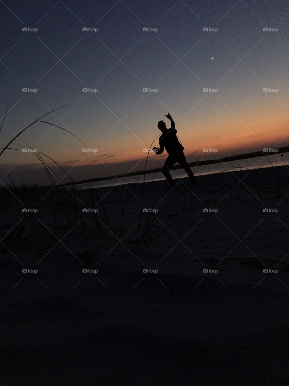 when a friend tries to ruin your sunset photo but ends up making it amazing. 