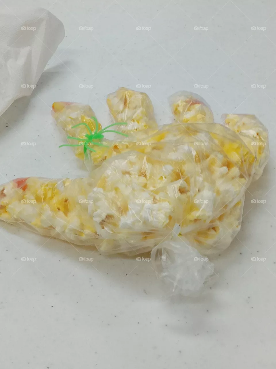 popcorn hand with a spider ring how creative is that? seniors are being kids again.