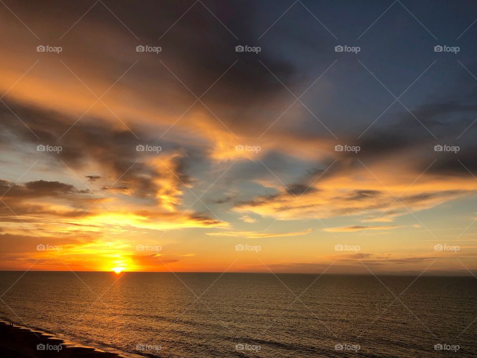 A captivating sunrise over the Atlantic Ocean in Myrtle Beach South Carolina. 