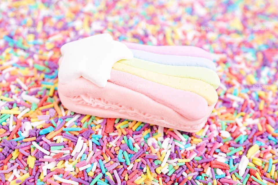 Rainbow macaron and Sugar sprinkle dots. Multi color of sugar sprinkle dots for cake and bakery decoration.