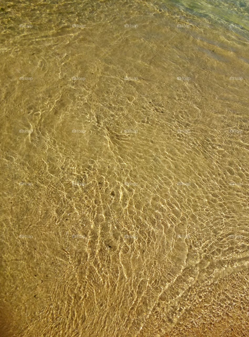 texture of water and sand bottom of the sea