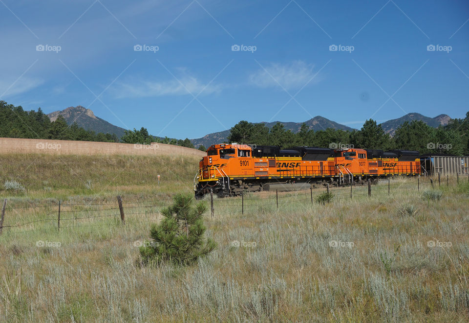 Train with mountain backdrop