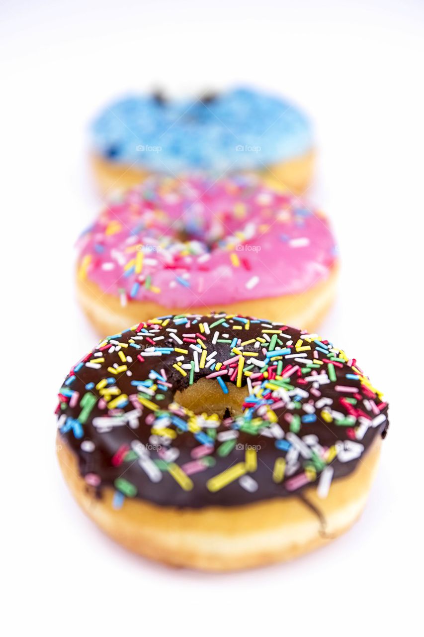 Delicious and colorful doughnuts with sprinkles