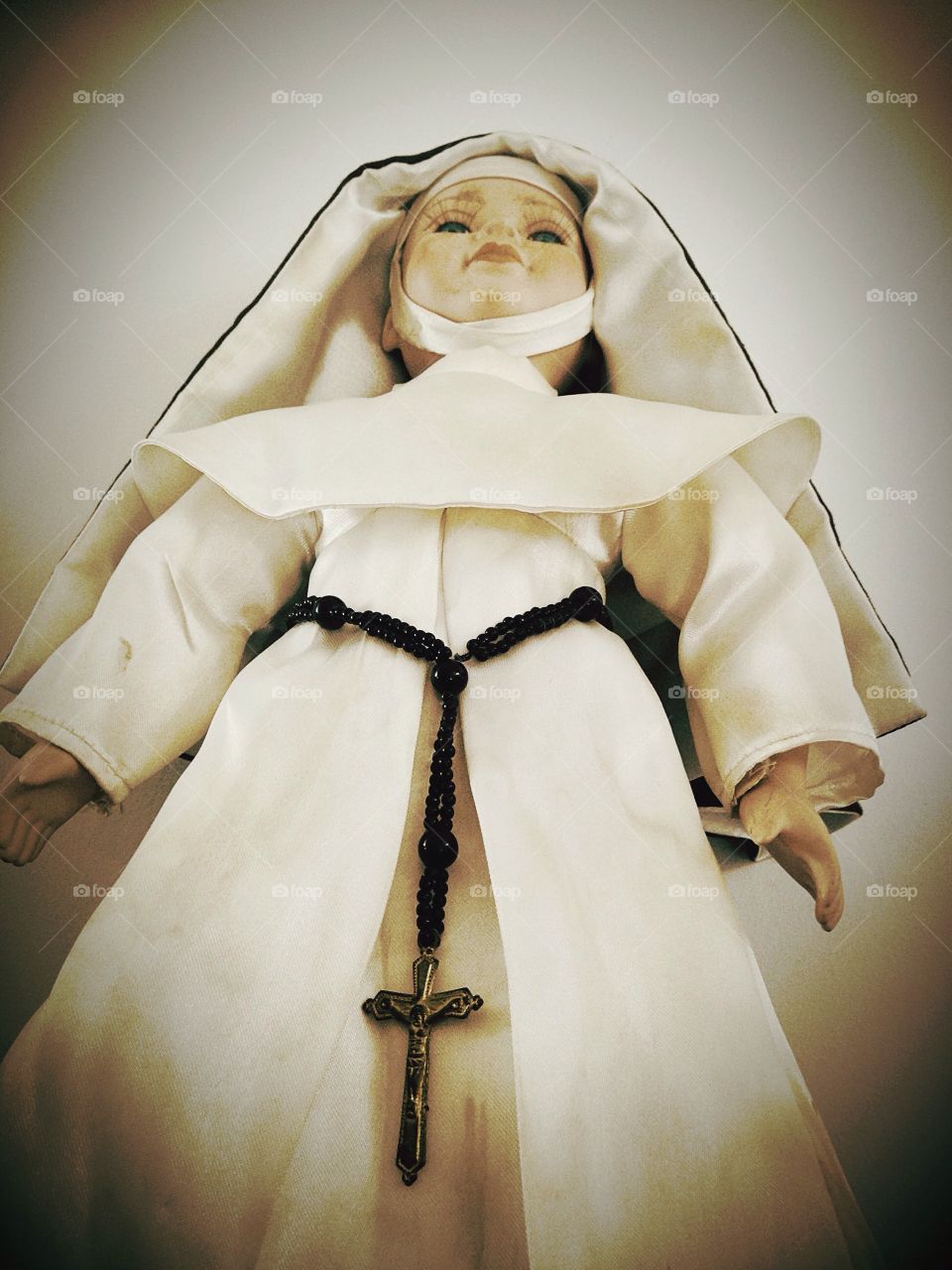 Catholic nun doll with rosary beads 