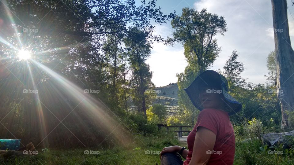 Sun Hat. wearing a sun Hat