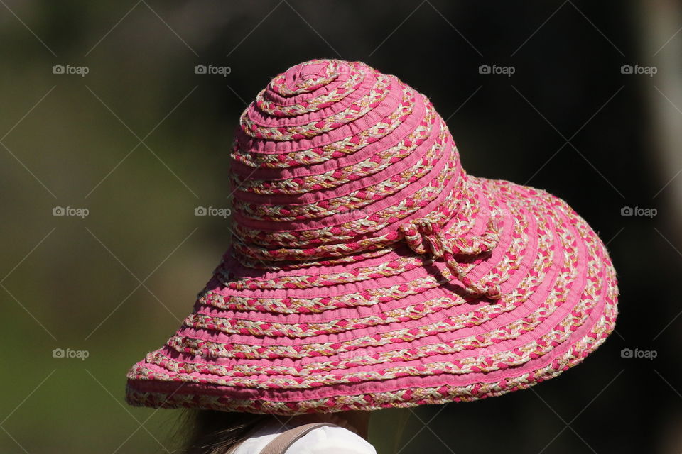 Close-up of a woman wearing sunhat