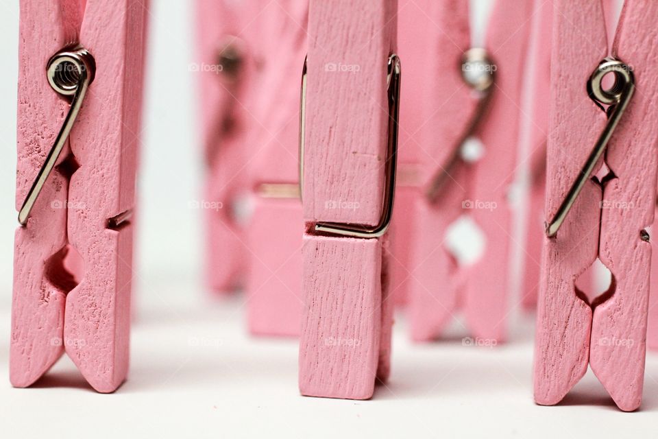 Close-up of pink clothes peg