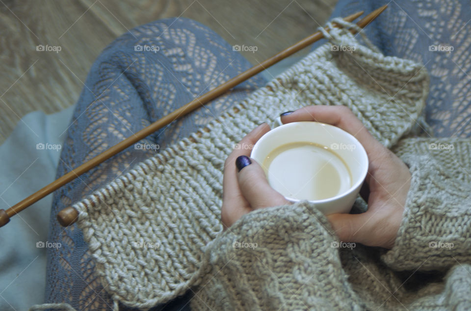 girl knits on the spokes