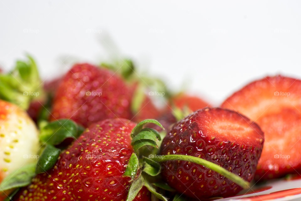 delicious red strawberries and white background 