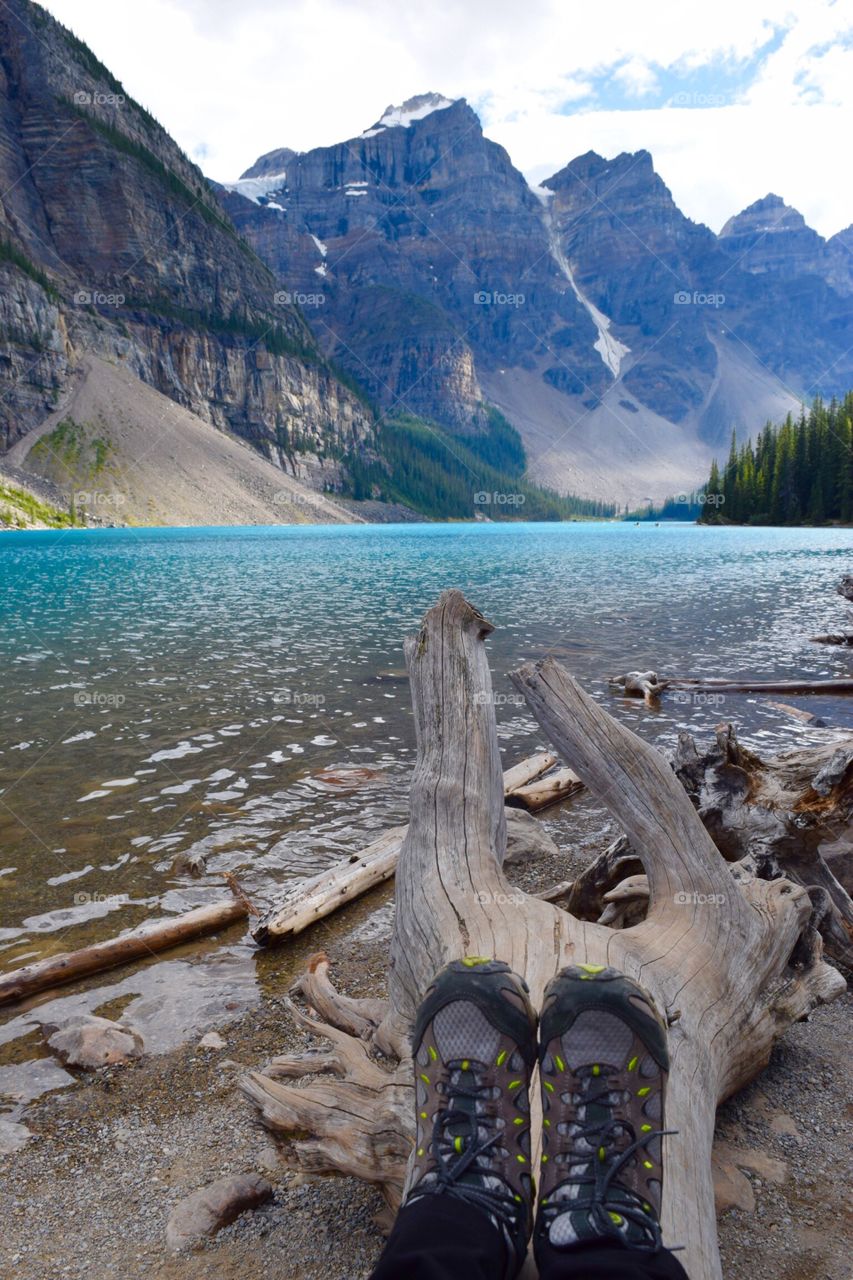 Relaxing by Moraine Lake in Alberta, Canada