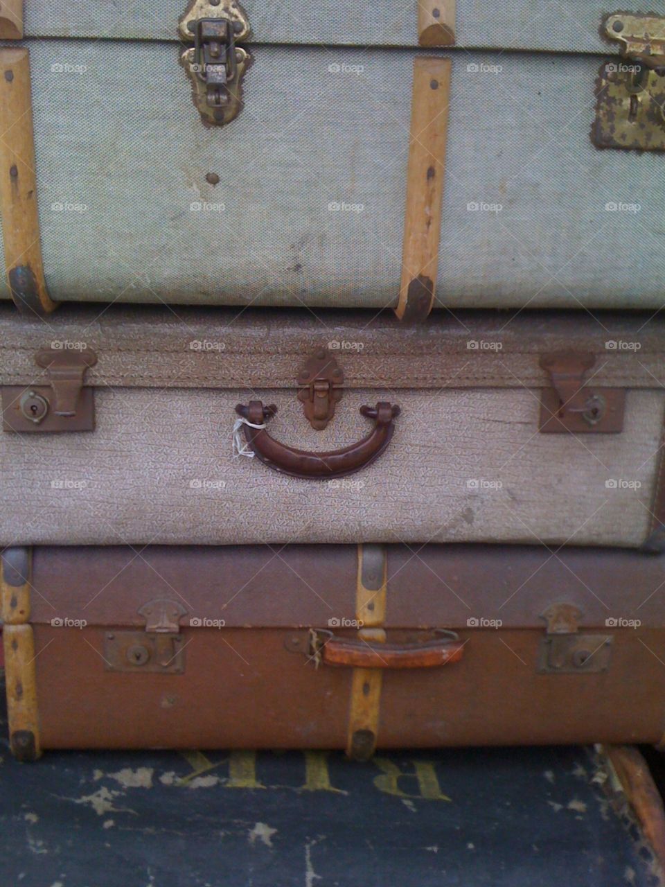 Old suitcases in a pile