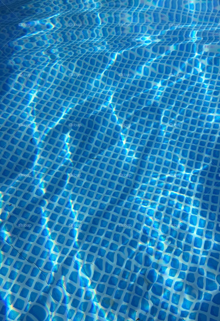 The bottom of my  water filled pool with all the squares , in a year color. 