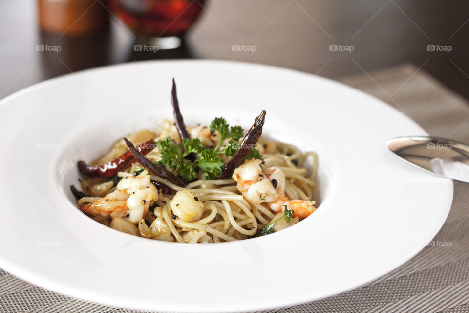 Spaguetti Olio. Pasta seafood with garlic and chilli