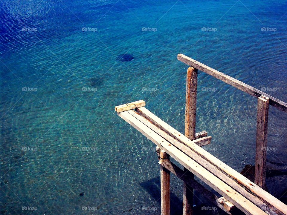 ocean and a pier. ocean and a pier