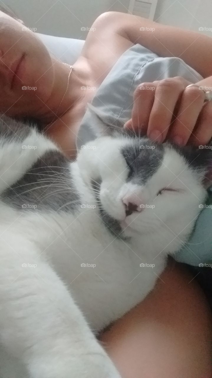 Snuggling with my baby cat in the morning