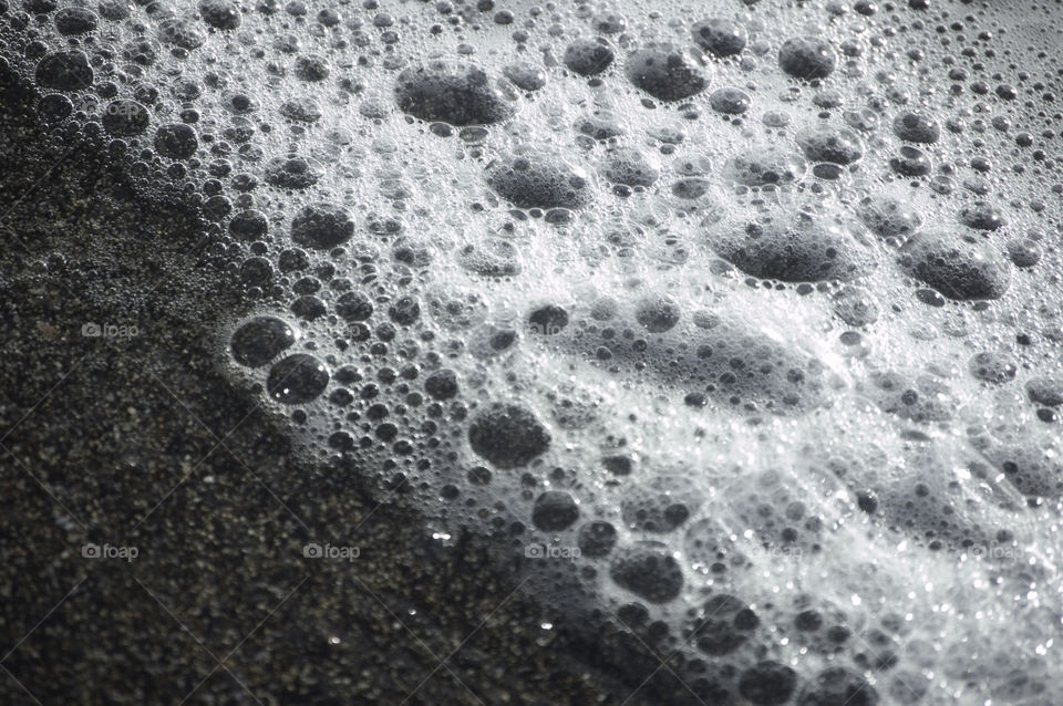 close-up of black sands beach in Maui Hawaii