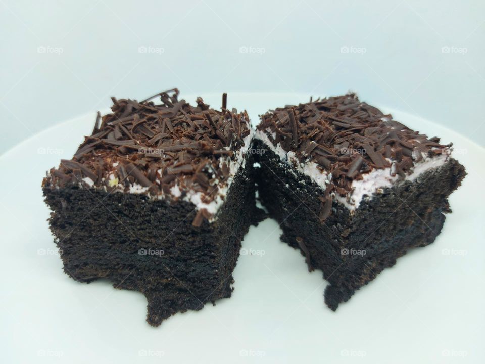 Chocolate taro cake on a white background