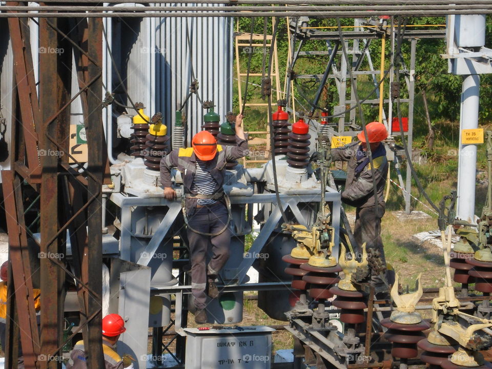 Brigade electricians repairing electrical equipment