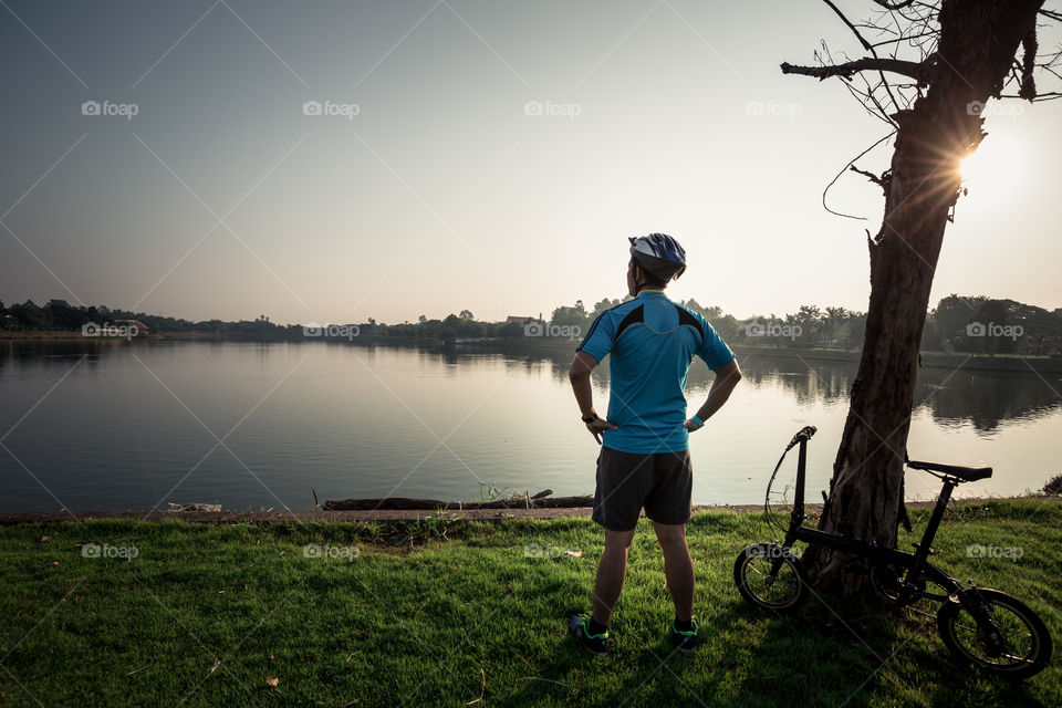 Man with bike in the park