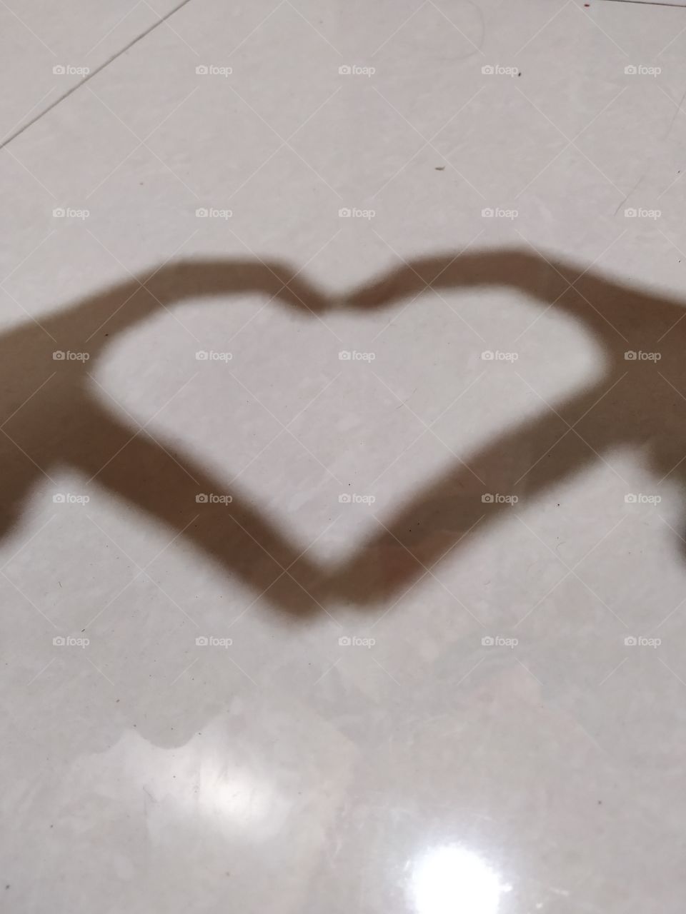 shadow is our friend who always with us. shadow is somebody who follow and watch us closely and often secretly. 🤗 that heart for that shadow.