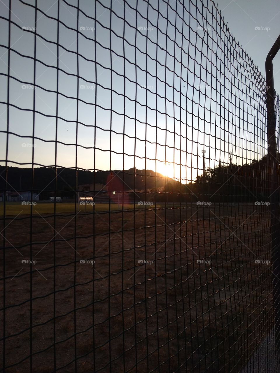 Sunset seen from the sports field