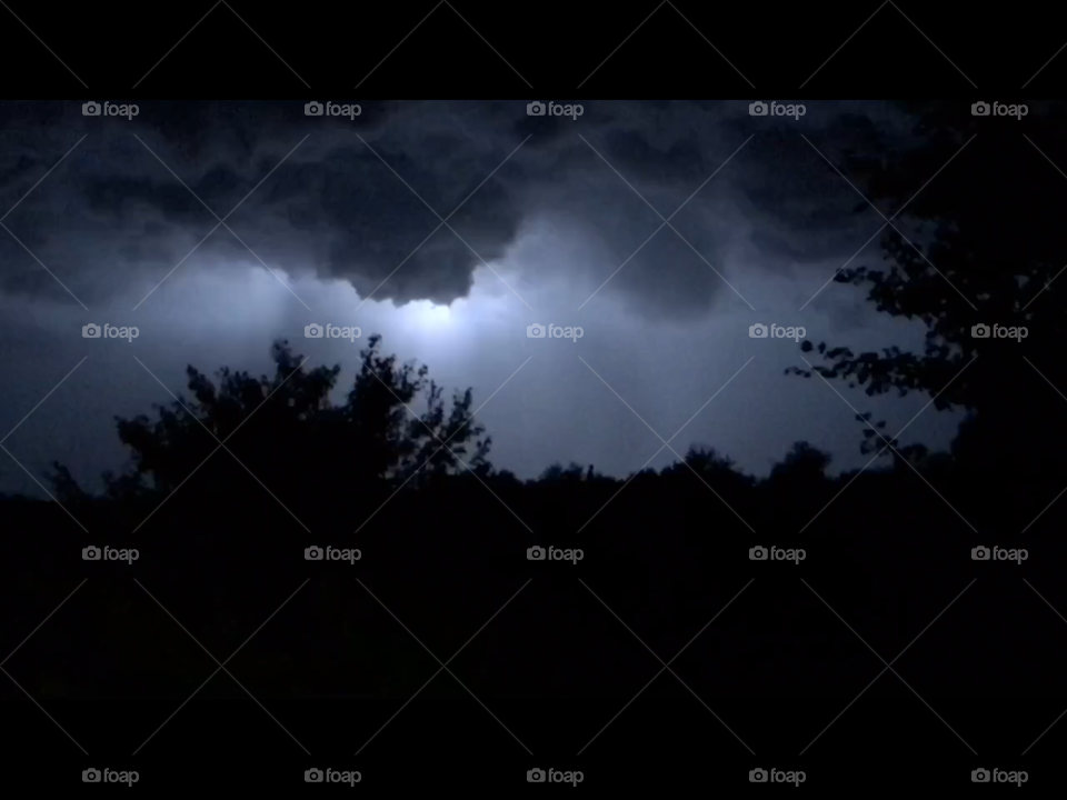 Lightning in the clouds during thunderstorms 