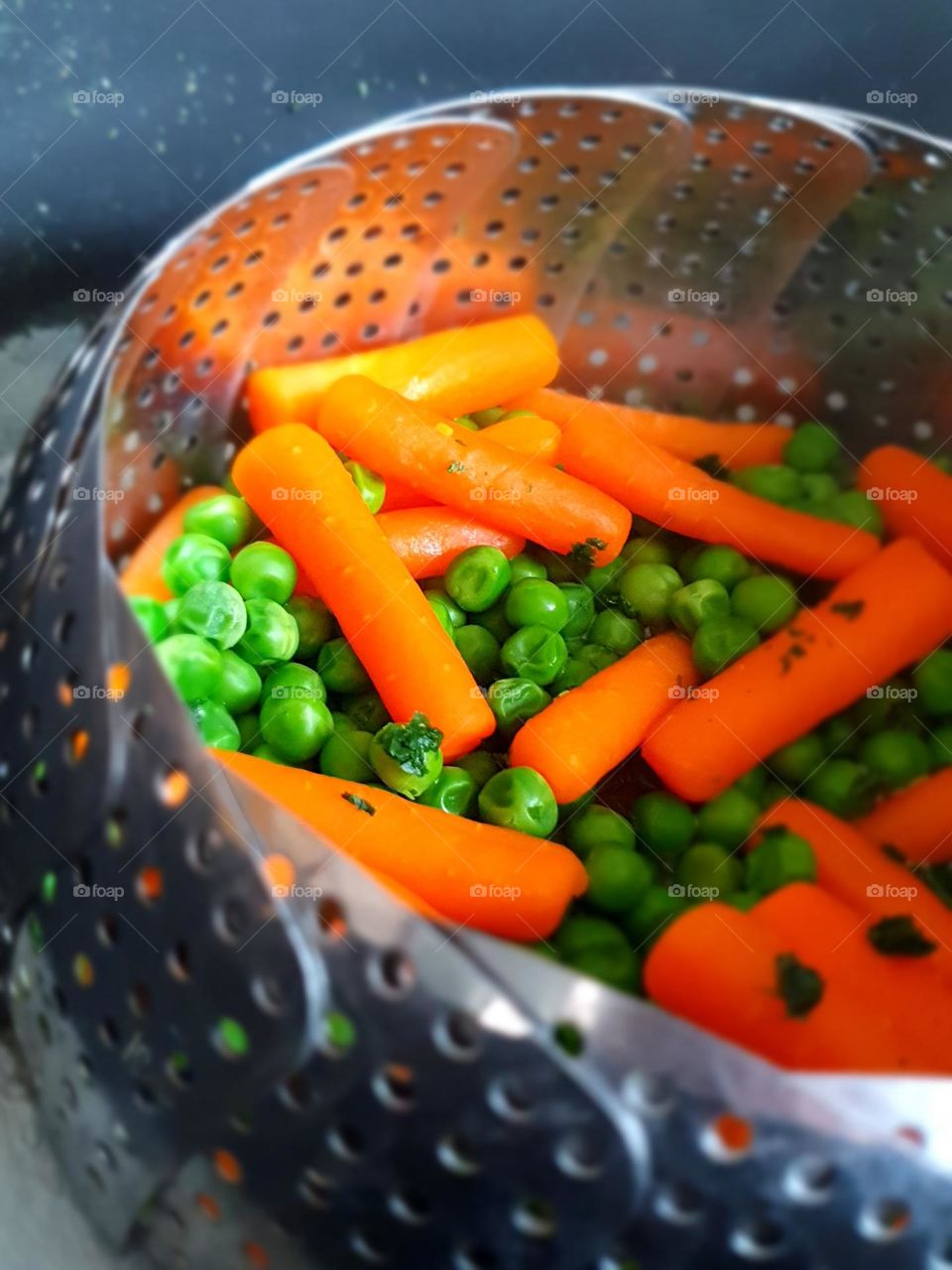 vegetables- healthy food - carrots & peas , kitchen work