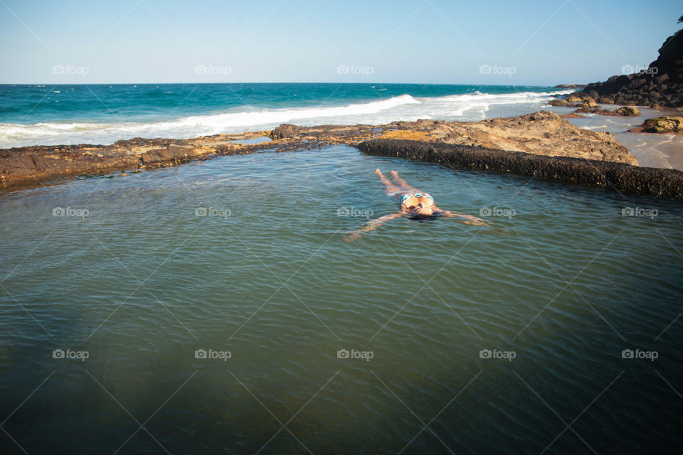 Let the vacation begin - relaxing at a natural pool
