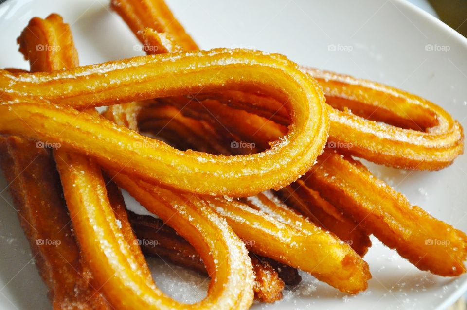 Churros, fritters, batons, fried, for coffee, chocolate, breakfast,