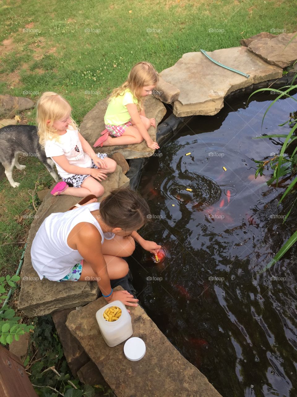 Girls Hanging Out at the Water Garden