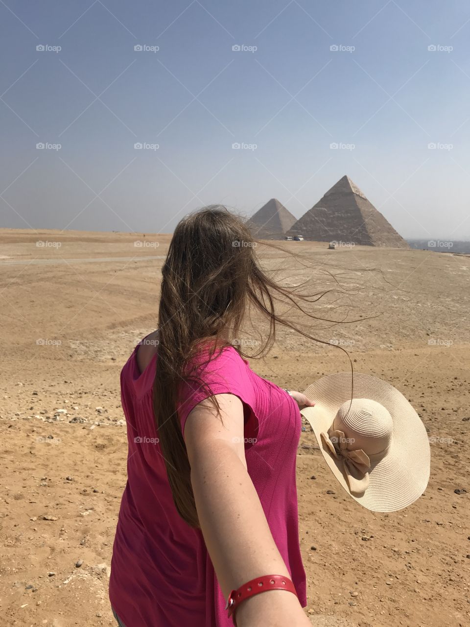 Come take a walk with me to the mysterious pyramids this beautiful morning with the wind in your hear.