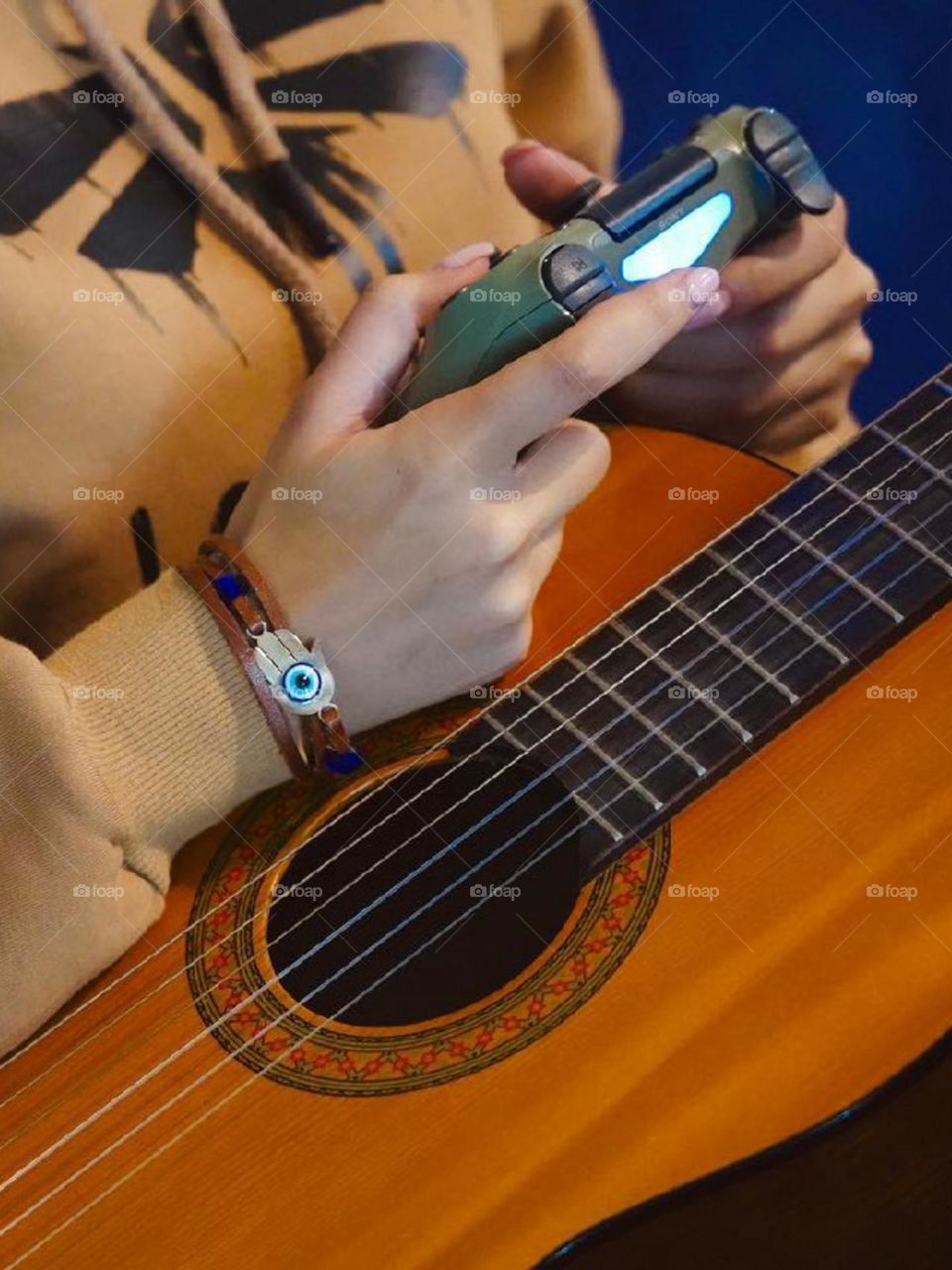 Playing game or playing guitar...both are enjoyable