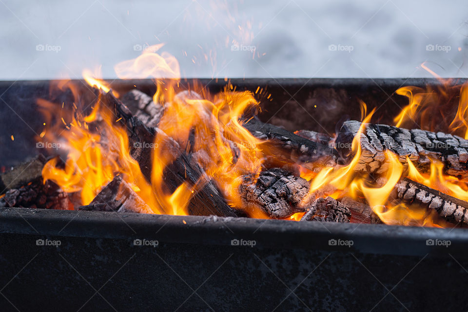 the fire in the brazier in winter