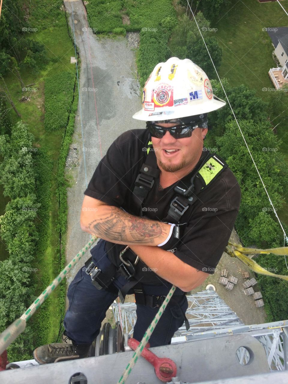 Lineman in the air,hard at work. Who says you can’t love what you do! 