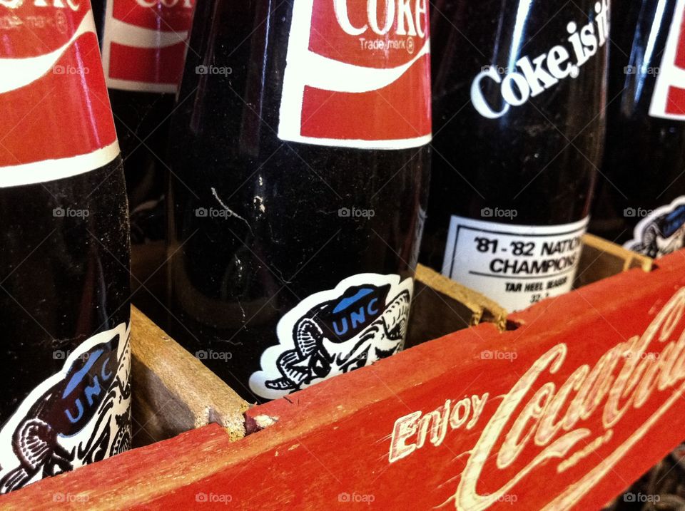 1982 coke bottles with vintage crate.