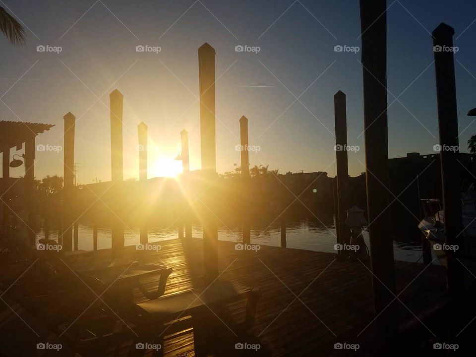et on the dock
sunset water docks
