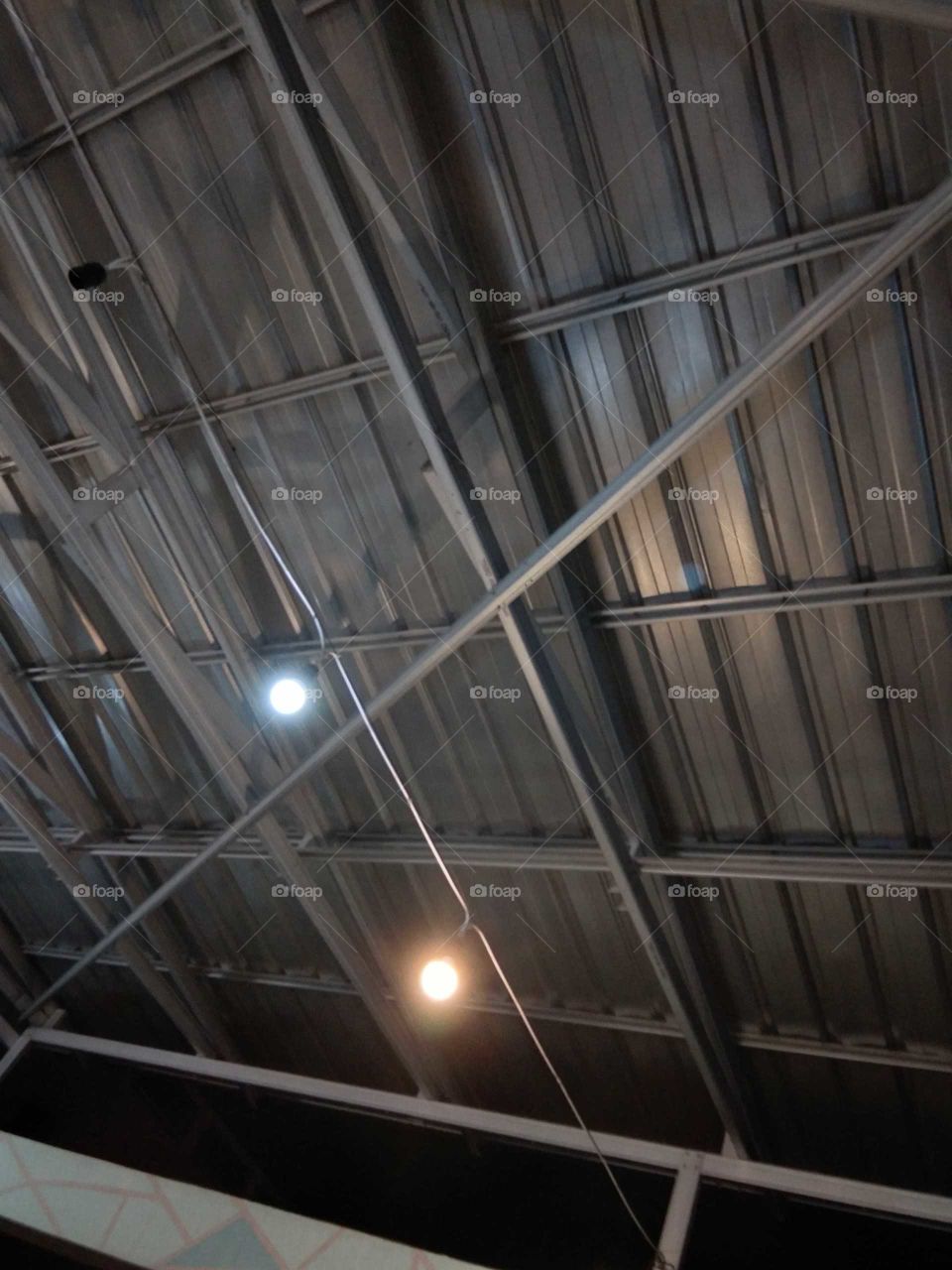Indoor aesthethic metal roof with some lights picture