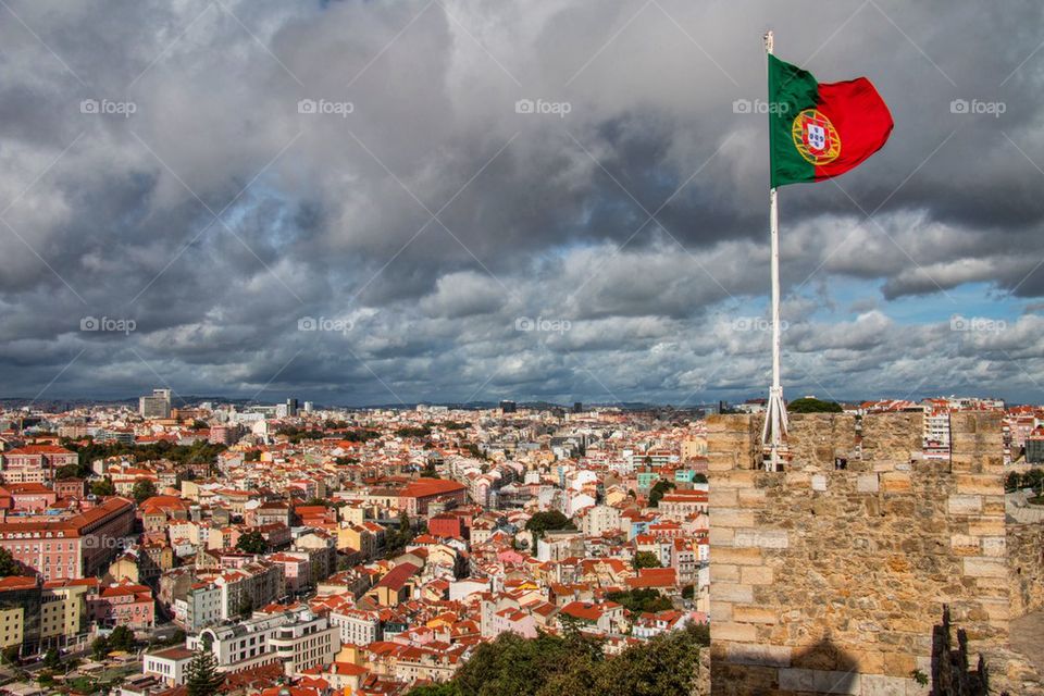 Portuguese flag over lisbon