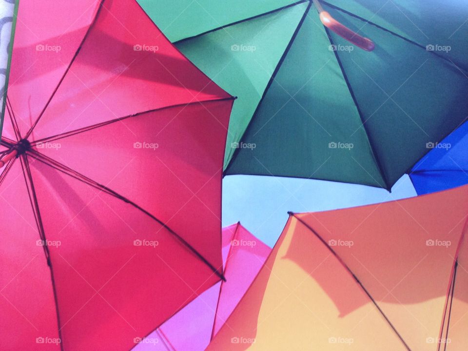 Rainbow umbrella shelter cover above