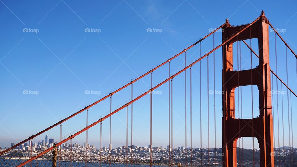 San Francisco Downtown in Backdrop of Golden Gate Bridge