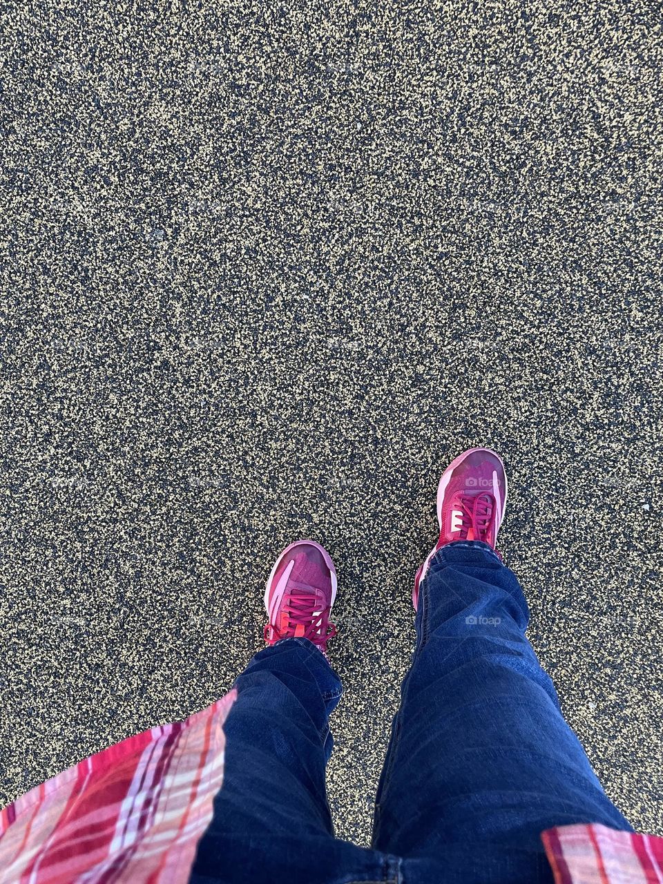 Walking outside on a playground, spending time on the playground, view from person looking down, first person perspective 