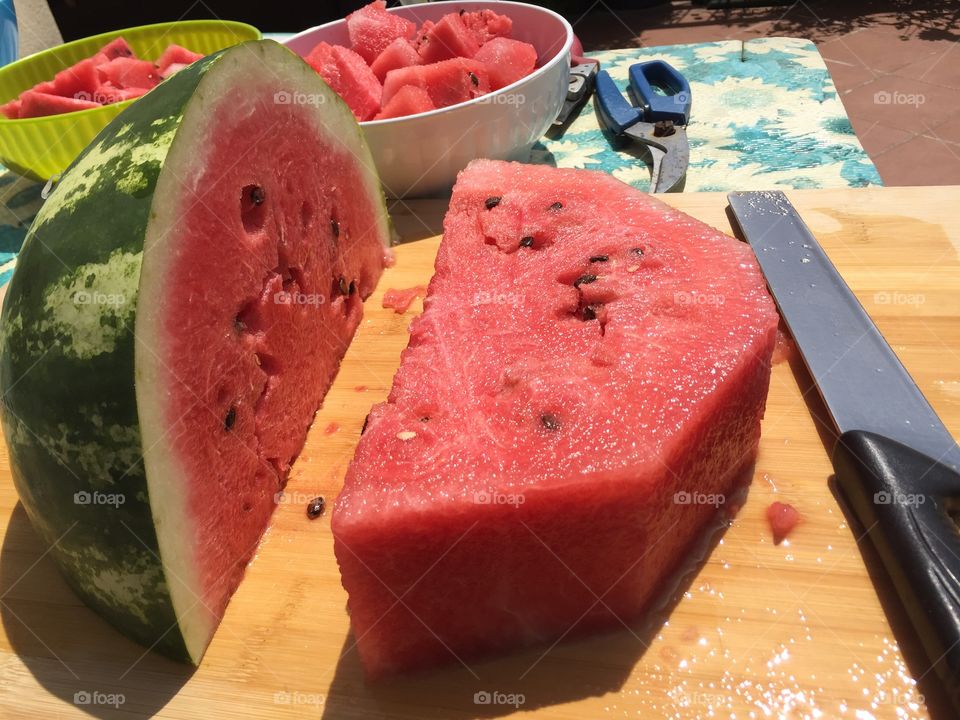 Slice of watermelon ready to eat in a hot and sunny day