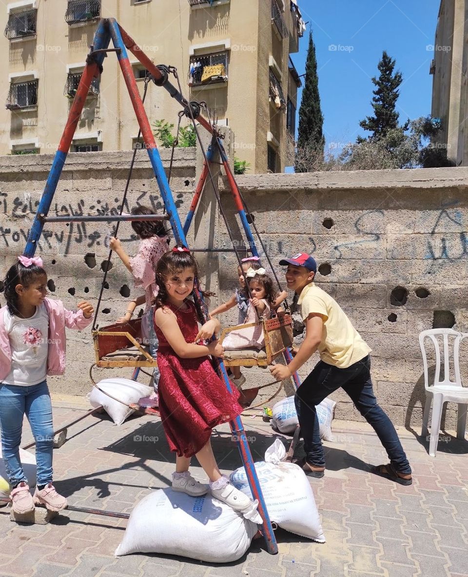 The picture of the children at play impresses me, I think it's wonderful