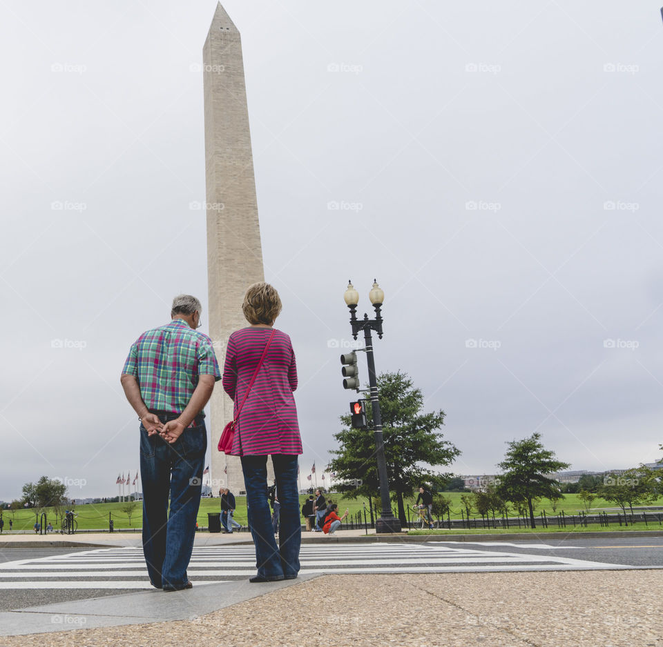 Couple enjoys the monument in DC. 
