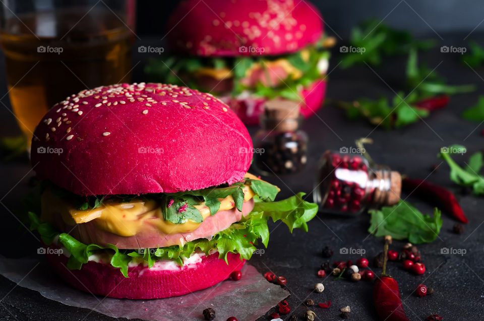 homemade burger with salad and sausage