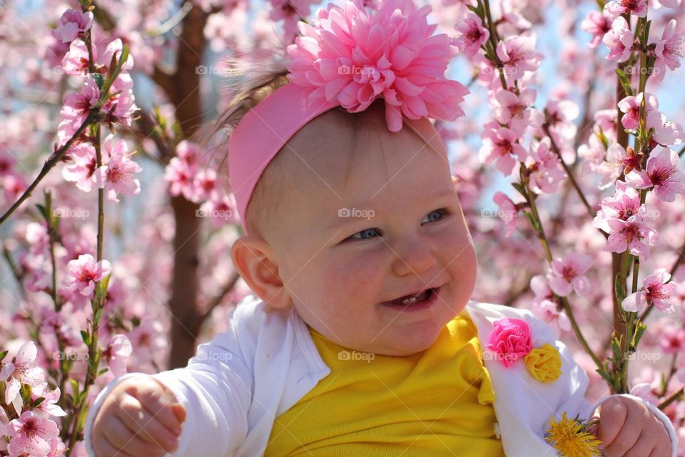 Baby in blossoms