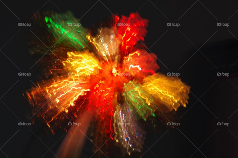 Interior.  Prince Albert, SK, CA.  Camera movement makes Christmas decoration mimic fireworks.