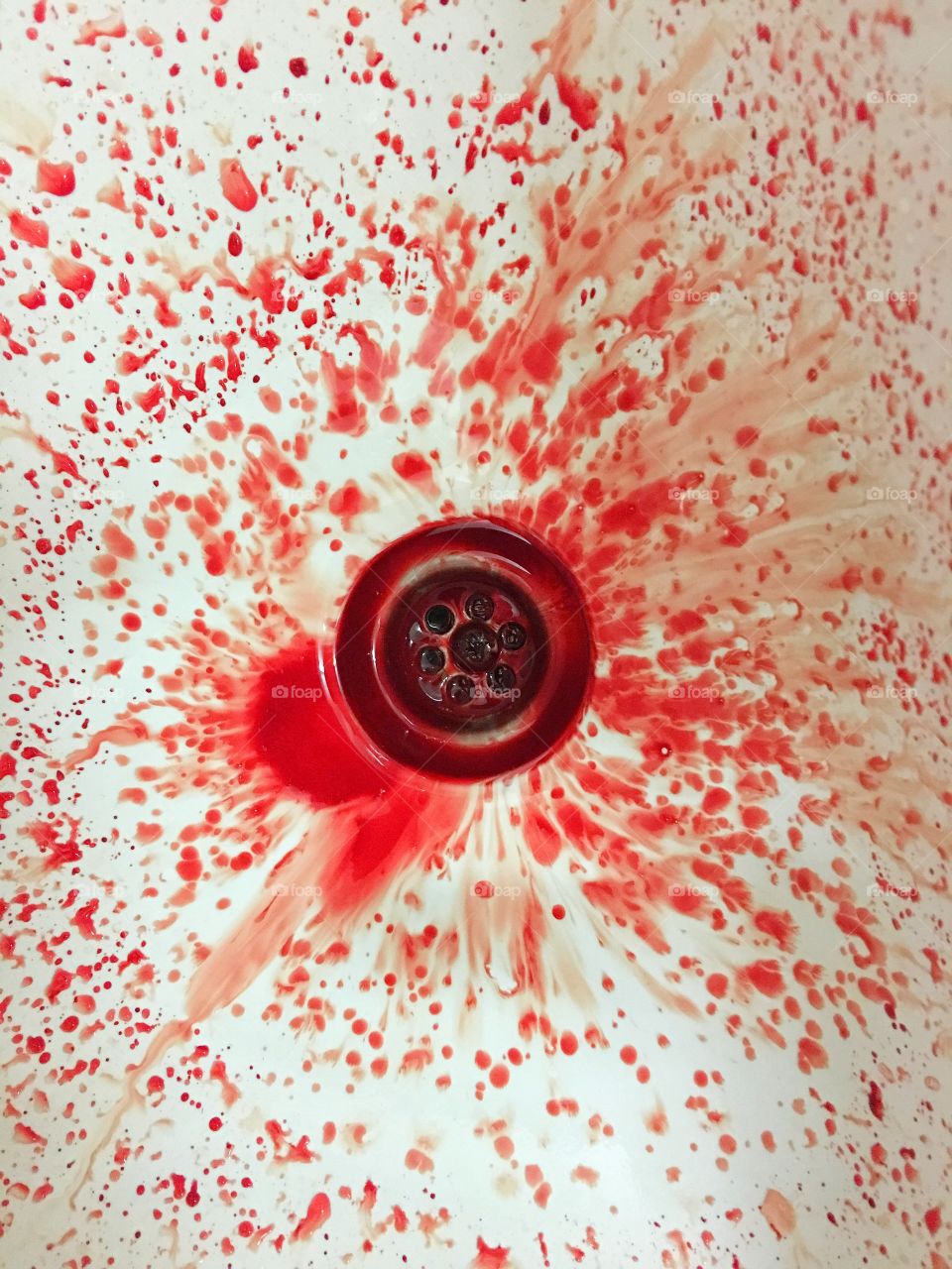 Nosebleed splattering in the sink