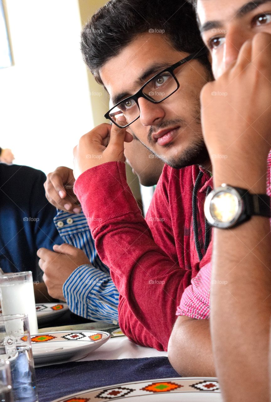 The stare. the piercing look of my friend captured when he realized that the subject of discussion at the breakfast table was him