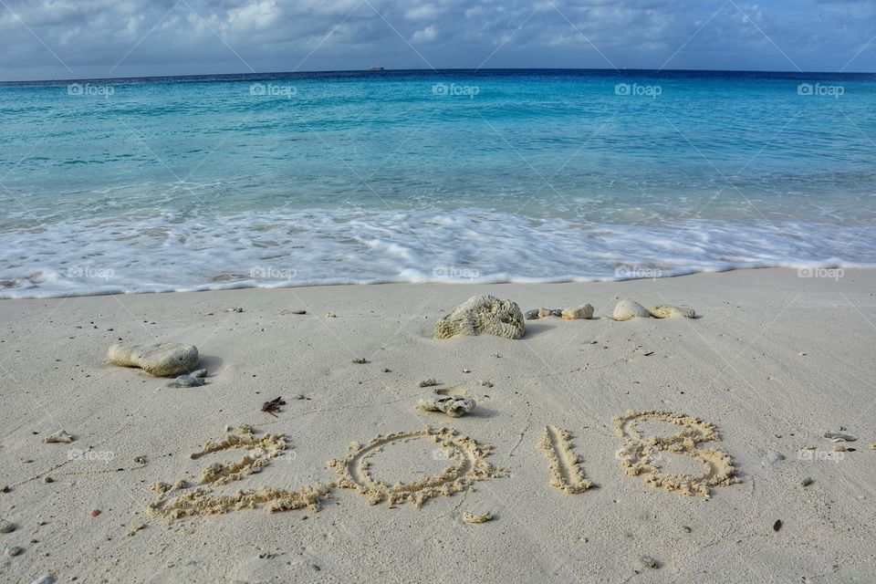 Writing 2018 on the beach